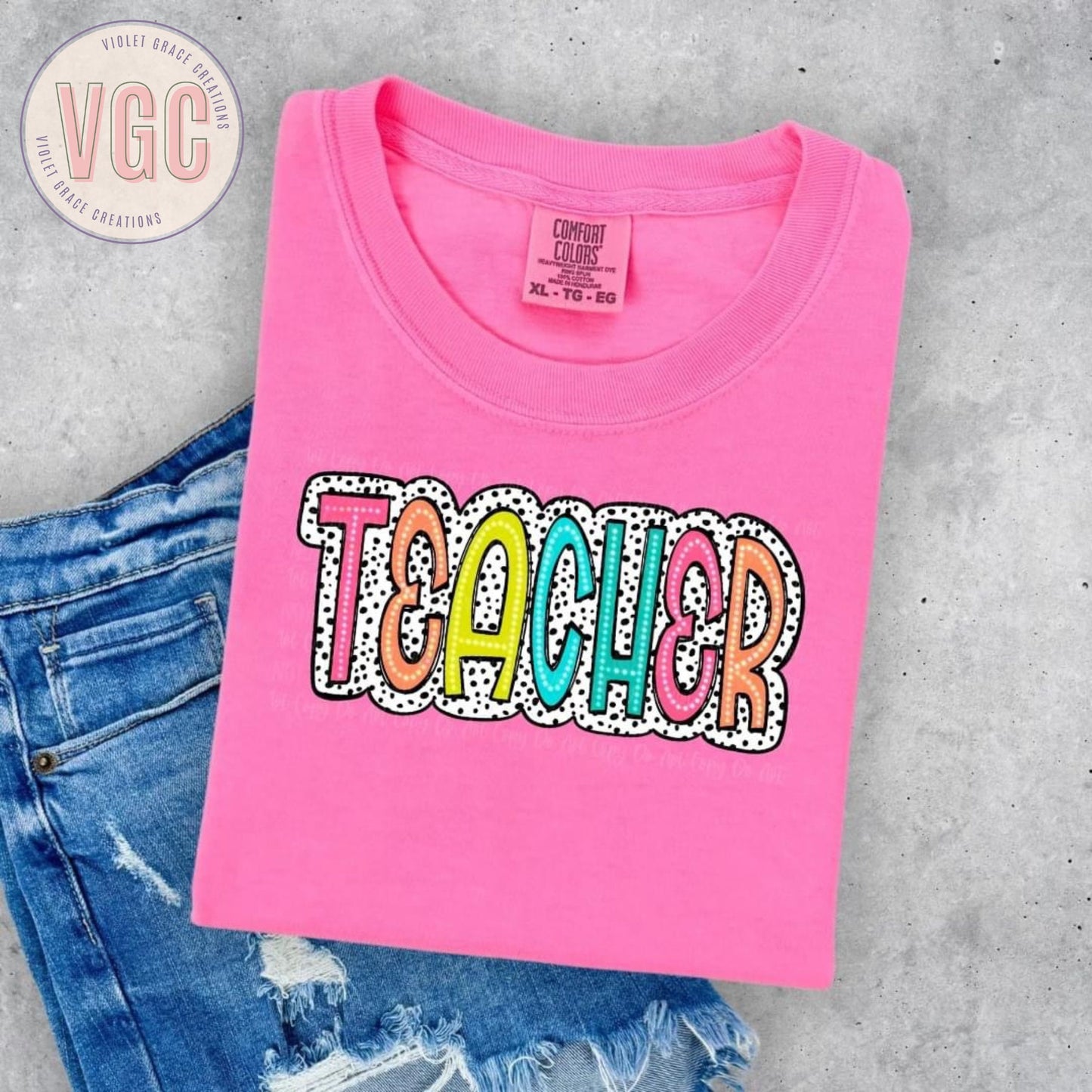 Bright & Fun Teacher Graphic T-Shirt: Colorful Designs for a Splash of Style!